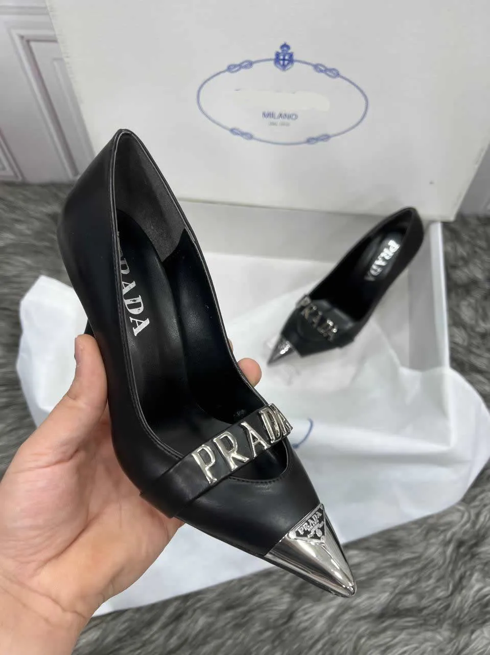 Pointed toe heeled shoes with Prad lettering