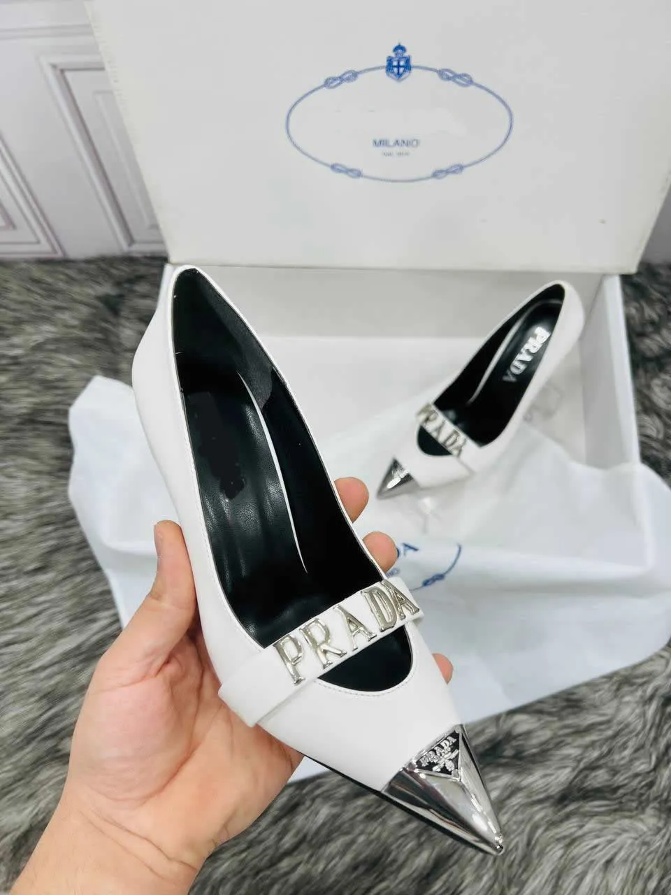 Pointed toe heeled shoes with Prad lettering